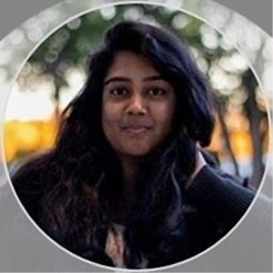 A image of a concrete sphere, balanced between two other larger spheres