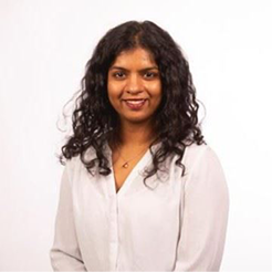 A image of a concrete sphere, balanced between two other larger spheres