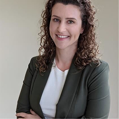 A image of a concrete sphere, balanced between two other larger spheres