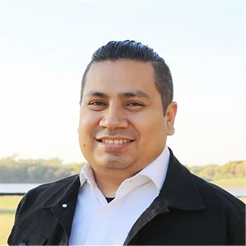 A image of a concrete sphere, balanced between two other larger spheres